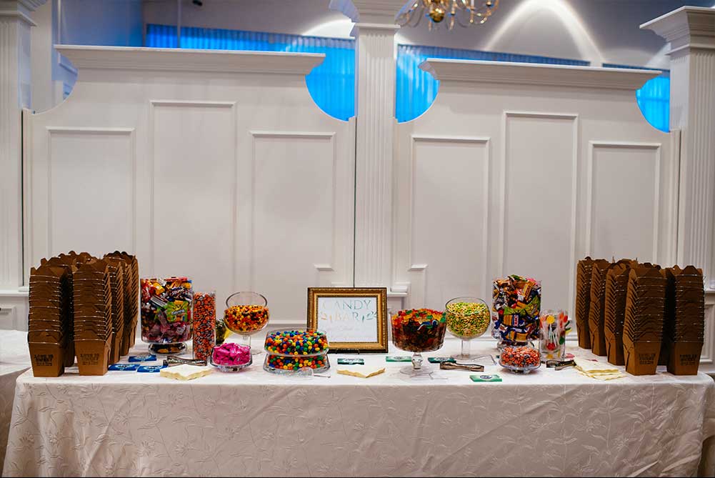 shot of candy bar in Carmen's foyer during wedding reception