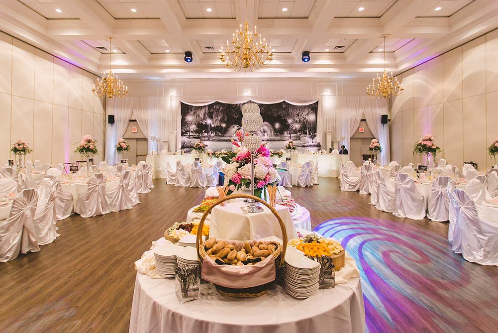 wide angle shot of ballroom at Carmen's showing antipasto buffet, and head table